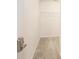 Empty walk-in closet with carpet and a single metal shelving rack at 8739 Grassy Oak Trl, North Charleston, SC 29420