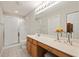Bathroom featuring a large vanity, framed mirror, and a glass enclosed shower at 103 Ashley Villa Cir # D, Charleston, SC 29414