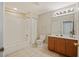 Well-lit bathroom featuring a shower-tub combo, toilet, and single-sink vanity at 103 Ashley Villa Cir # D, Charleston, SC 29414