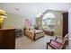 Cozy bedroom with vaulted ceilings, large window, and comfortable furnishings at 103 Ashley Villa Cir # D, Charleston, SC 29414