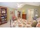 Relaxing bedroom featuring light green walls, a vaulted ceiling, and adjoining bathroom access at 103 Ashley Villa Cir # D, Charleston, SC 29414