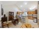 Open kitchen and dining area with breakfast bar, ideal for casual dining and entertaining at 103 Ashley Villa Cir # D, Charleston, SC 29414