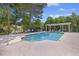 Community pool with a pergola, ample deck space, and clear blue water at 103 Ashley Villa Cir # D, Charleston, SC 29414