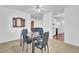 The dining area has a ceiling fan, a modern table, and comfortable seating, perfect for gatherings at 103 Greencastle Dr, Goose Creek, SC 29445