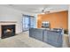 Bright living room featuring a fireplace, sliding doors and an orange accent wall at 103 Greencastle Dr, Goose Creek, SC 29445