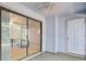 Enclosed porch with a sliding glass door, painted walls, and a ceiling fan at 103 Greencastle Dr, Goose Creek, SC 29445