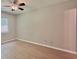 Bedroom with wood-look flooring, a ceiling fan, and a bright window at 108 Alston Cir, Goose Creek, SC 29445