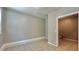 Bright, airy room with tile flooring, light gray walls, and a convenient doorway for flexible use at 108 Alston Cir, Goose Creek, SC 29445