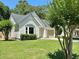 Charming one-story home with a well-maintained lawn, a tidy landscape, and an attached garage at 108 Alston Cir, Goose Creek, SC 29445