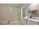 Functional laundry room features a washer, dryer, utility sink and storage space at 108 Alston Cir, Goose Creek, SC 29445