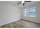 A bedroom with hardwood floors, two windows allowing natural light at 1105 Crull Dr, Charleston, SC 29407