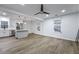 Open floor plan showing the kitchen, living area, and windows, showcasing natural light at 1105 Crull Dr, Charleston, SC 29407