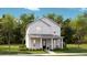 Charming two-story home featuring a welcoming front porch and classic architectural details at 111 Battle Boat Blvd, Summerville, SC 29485