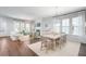 Open-concept living and dining area with abundant natural light and modern decor at 111 Battle Boat Blvd, Summerville, SC 29485