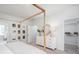 Bright, airy bedroom featuring a decorative dresser with framed photos, adjacent to a walk in closet at 111 Battle Boat Blvd, Summerville, SC 29485