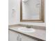 The bathroom features a white vanity and sink, with a large mirror at 1120 Hidden Cove Dr # I, Mount Pleasant, SC 29464