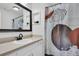 This bathroom features a modern sink and vanity, as well as a shower/tub combo with a decorative shower curtain at 1120 Hidden Cove Dr # I, Mount Pleasant, SC 29464