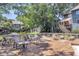 Inviting outdoor deck with comfortable seating overlooking the serene water feature and lush landscaping at 1120 Hidden Cove Dr # I, Mount Pleasant, SC 29464