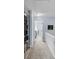 Upstairs hallway with neutral carpet leading to bedrooms at 1120 Hidden Cove Dr # I, Mount Pleasant, SC 29464