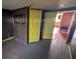 Spacious room with yellow doors, dark walls, and hard surface flooring, perfect for customization at 116 Stillfield Dr, Moncks Corner, SC 29461