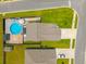 An aerial view of a home that features a private backyard pool, mature trees, and attached two-car garage at 118 Lagoona Dr, Summerville, SC 29483