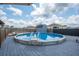 Relaxing backyard space showcasing an above-ground pool with decking at 118 Lagoona Dr, Summerville, SC 29483