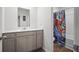 Charming bathroom with vanity, framed mirror, and shower-tub combo with octopus shower curtain at 118 Lagoona Dr, Summerville, SC 29483