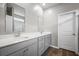Stylish bathroom features a dual sink vanity with ample storage and a large mirror providing plenty of natural light at 118 Lagoona Dr, Summerville, SC 29483