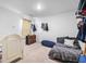 Neutral bedroom with ample light, closet and dresser with carpet floors at 118 Lagoona Dr, Summerville, SC 29483