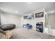 Upstairs bonus room with soft carpet and natural light is perfect for a playroom or media room at 118 Lagoona Dr, Summerville, SC 29483
