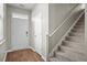 Bright entryway featuring a staircase and a front door with transom window at 118 Lagoona Dr, Summerville, SC 29483