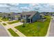 Charming two-story home with lush lawn, mature landscaping, private backyard pool, and attached two-car garage at 118 Lagoona Dr, Summerville, SC 29483