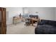 Efficient home office featuring two desks, a comfortable chair, and extra sofa seating at 118 Lagoona Dr, Summerville, SC 29483