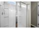 Modern shower with glass doors and bright white tile at 118 Lagoona Dr, Summerville, SC 29483