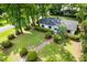 Lovely aerial view showcasing a well-maintained yard, beautiful landscaping, and mature trees at 1203 Forestwood Dr, Charleston, SC 29407