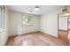 Bright bedroom with hardwood floors, neutral paint, and a large window with a view of outside at 1203 Forestwood Dr, Charleston, SC 29407