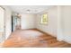 Another bedroom featuring wood floors, neutral walls, and a view to the outside at 1203 Forestwood Dr, Charleston, SC 29407