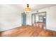 Inviting living room featuring hardwood floors, recessed lighting, and soft gray trim, creating a warm and stylish space at 1203 Forestwood Dr, Charleston, SC 29407