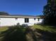 Charming house with a well-maintained backyard and a cozy patio area for outdoor relaxation and entertaining at 1229 Winston St, Charleston, SC 29407