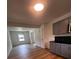 Bright kitchen showcases updated cabinets and seamless access to the living spaces at 1229 Winston St, Charleston, SC 29407