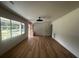 Bright and airy living room featuring wood floors, modern lighting, and large windows at 1229 Winston St, Charleston, SC 29407