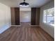 Spacious living area with decorative accent wall, wood floors, and modern lighting at 1229 Winston St, Charleston, SC 29407