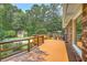Relaxing deck area with a view of the sparkling pool and lush greenery at 133 Axtell Dr, Summerville, SC 29485
