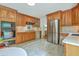 Spacious kitchen with wooden cabinets, stainless steel appliances, and tile flooring at 133 Axtell Dr, Summerville, SC 29485