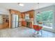 Well-lit kitchen featuring wooden cabinetry, stainless steel appliances, and a breakfast nook at 133 Axtell Dr, Summerville, SC 29485