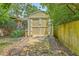 Large backyard shed with double doors and a ramp, perfect for storage or a workshop at 133 Axtell Dr, Summerville, SC 29485