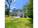 Large, grassy backyard with patio, perfect for outdoor entertaining and relaxation at 133 Pelican Lane, Summerville, SC 29485