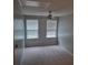 Bedroom with neutral carpet, blinds, and a ceiling fan at 133 Pelican Lane, Summerville, SC 29485