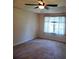 Neutral bedroom with a ceiling fan, carpet and a window with translucent curtains at 133 Pelican Lane, Summerville, SC 29485
