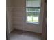 Walk-in closet with window for natural light and wire shelving at 133 Pelican Lane, Summerville, SC 29485